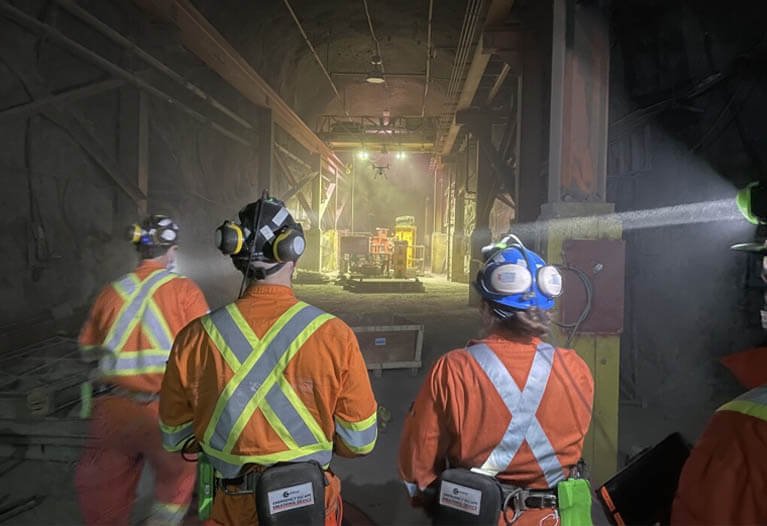 Hi-vis hard hat covers with reflective tape for enhanced head protection visibility in mining operations