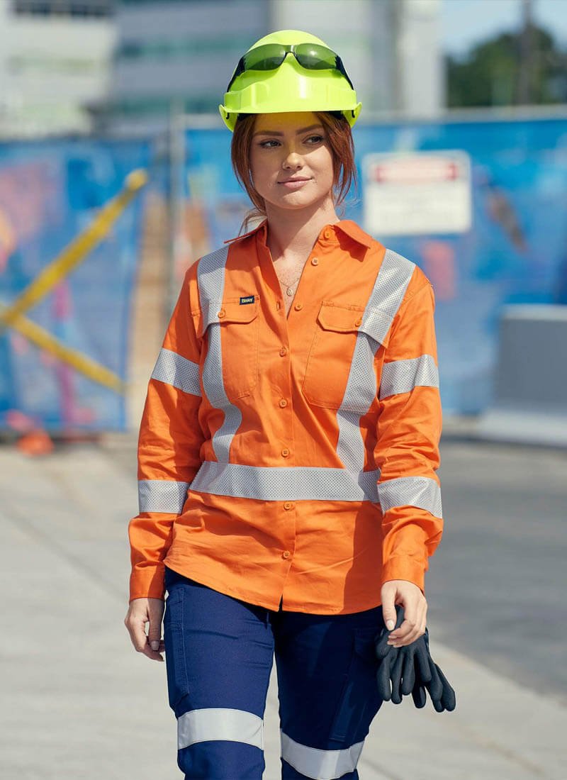 Mining workers wearing lightweight breathable hi-vis clothing in hot weather conditions