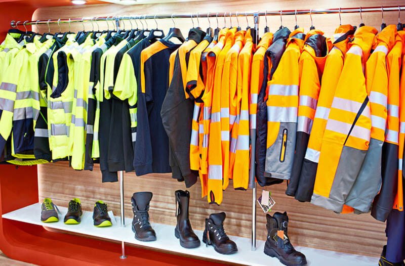 Marine terminal worker in waterproof hi-vis jacket working in harsh weather conditions