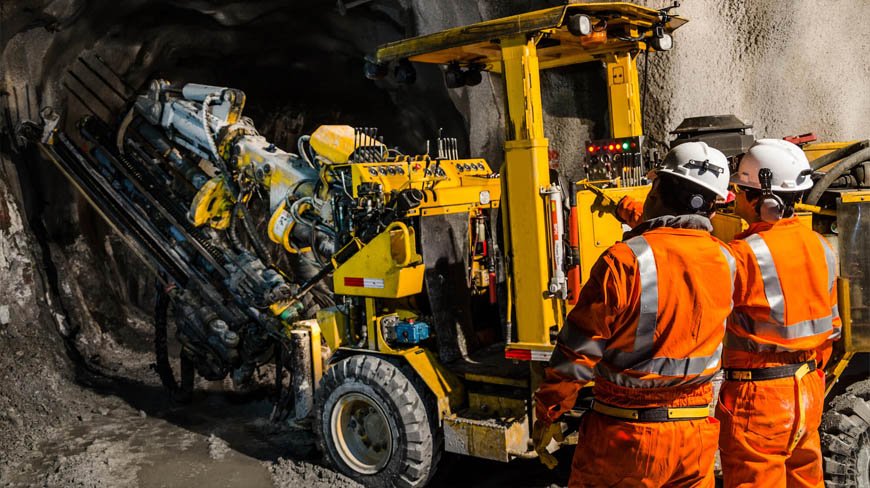 Mining Workers in Heavy-Duty Hi-Vis Safety Apparel