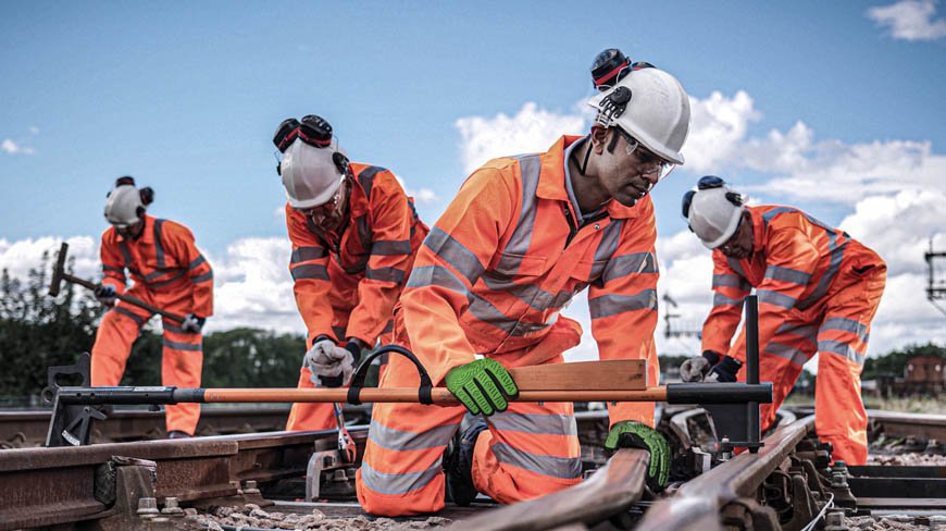 Railway Workers in Specialized Hi-Vis Safety Clothing