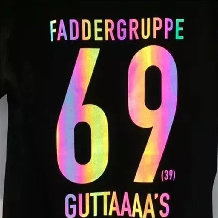 Reflective logo applied using heat transfer vinyl on a t-shirt